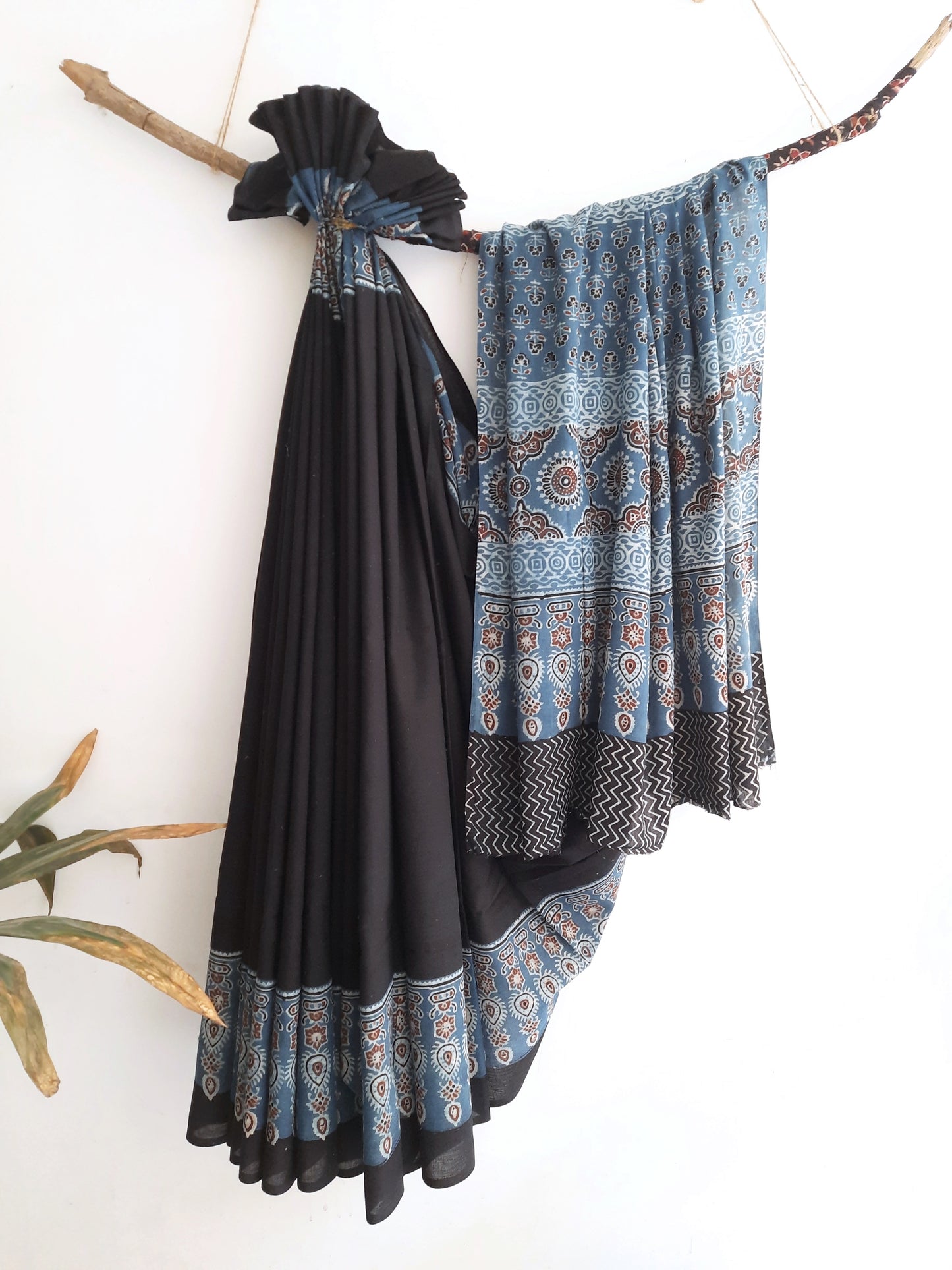 Handcrafted black and indigo Ajrakh hand block print saree from Turquoisethestore, showcasing timeless elegance and sustainable craftsmanship.