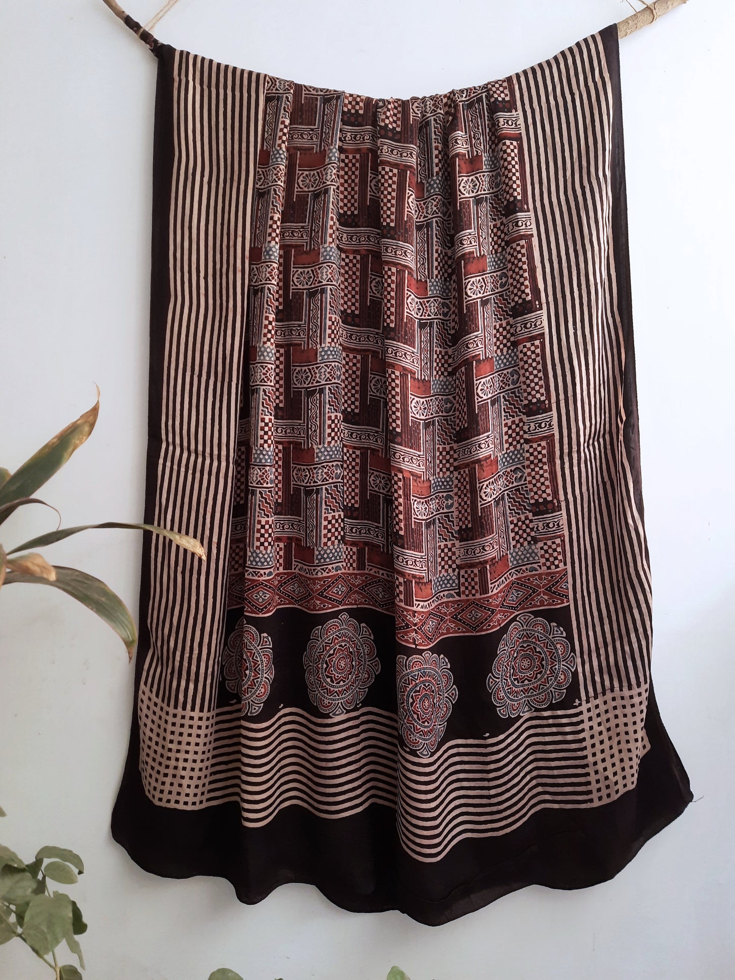Luxurious Black Ajrakh Modal Silk Dupatta - Handcrafted with indulgently soft modal silk, featuring Ajrakh hand block printing and natural dyeing. A captivating addition to your wardrobe, offering timeless style and ethical craftsmanship.