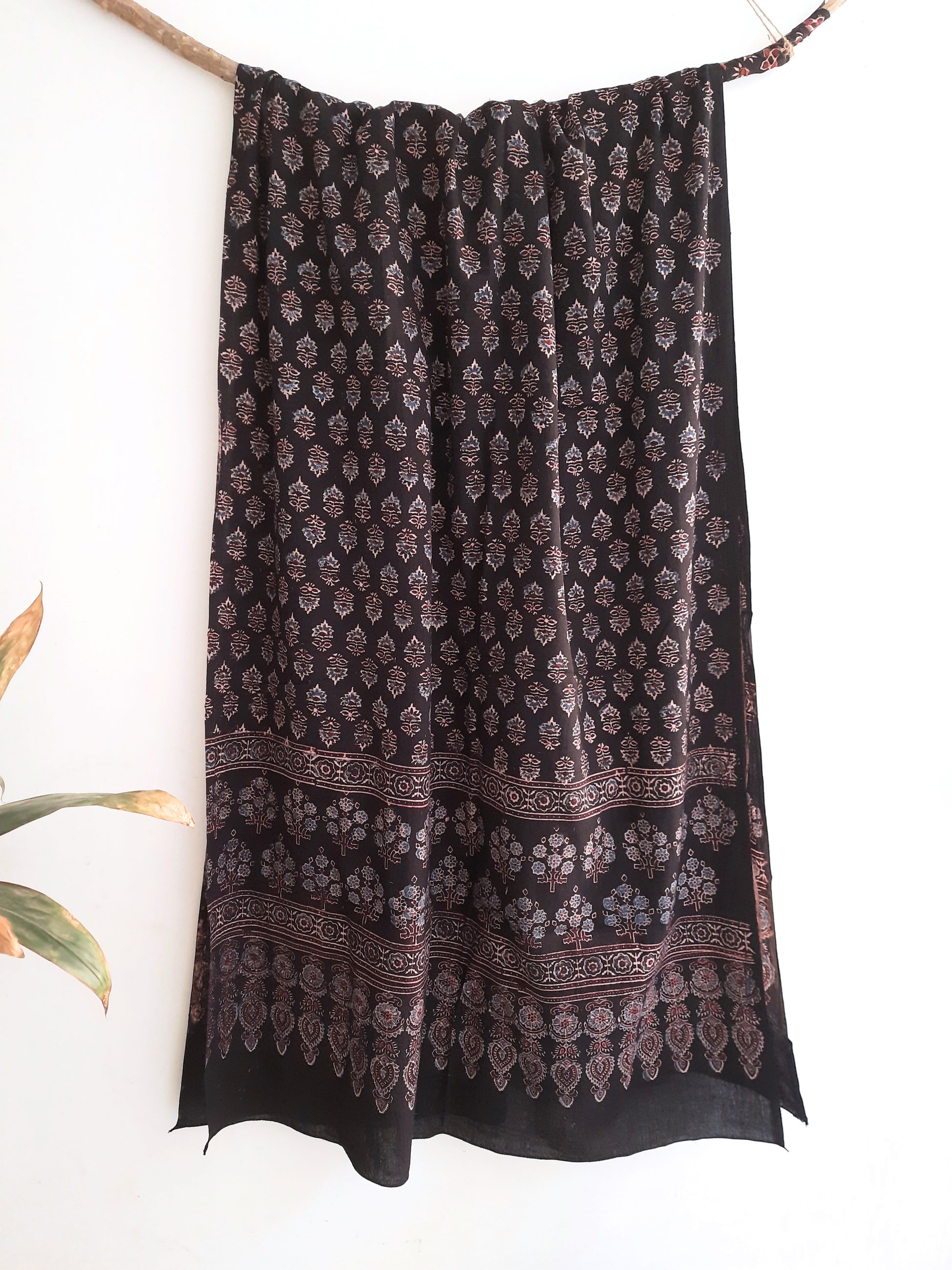 Turquoisethestore's Black Ajrakh Cotton Dupatta: Elevate your summer look with this eco-friendly, handmade piece. Crafted from pure cotton using traditional ajrakh printing, it adds adaptable charm to every outfit. Shop now!