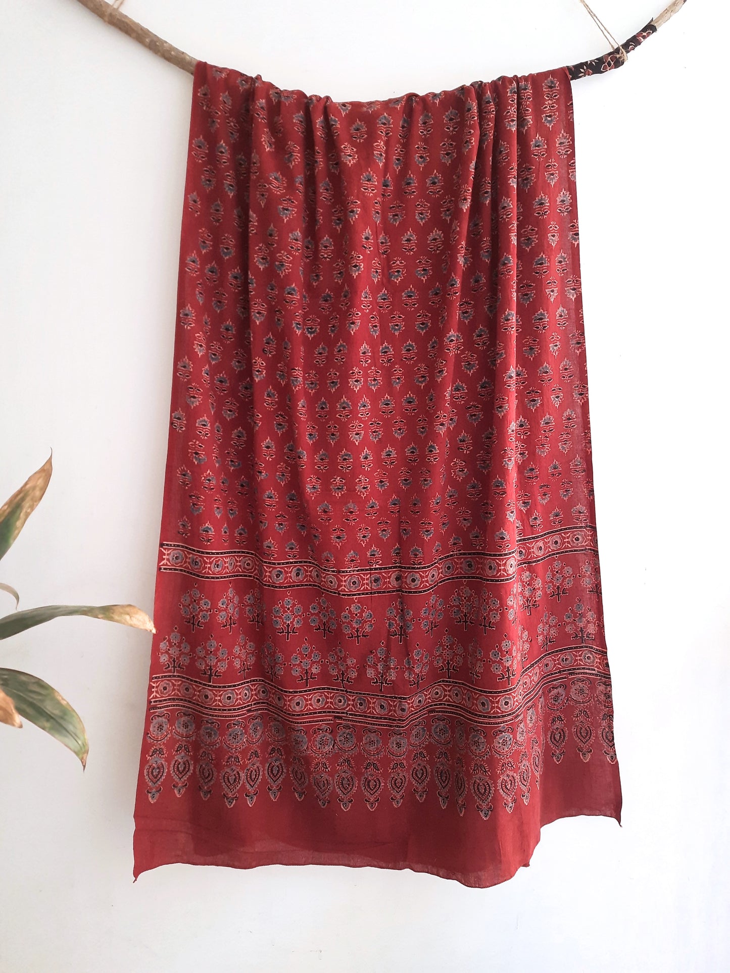 Madder Dyed Ajrakh Cotton Dupatta from Turquoisethestore: Handcrafted from pure cotton, adorned with traditional ajrakh prints. Elevate your summer style with this sustainable, versatile, and timeless artisanal piece. Shop now!