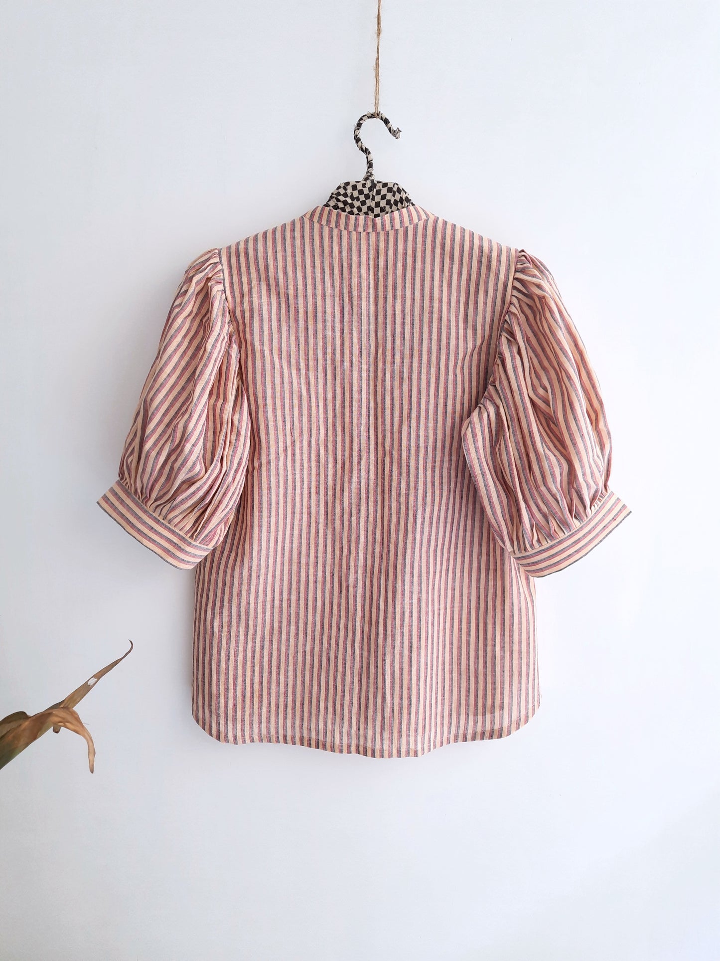 Striped hand-spun cotton shirt with mandarin collar and puffy sleeves for women.