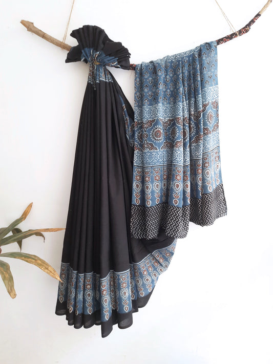 Handcrafted black and indigo Ajrakh hand block print saree from Turquoisethestore, showcasing timeless elegance and sustainable craftsmanship.