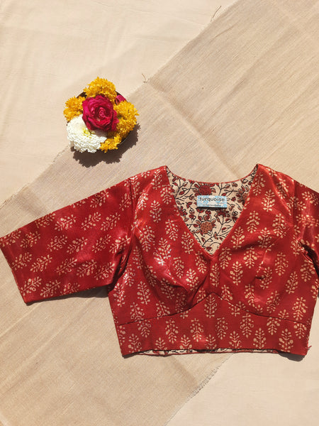 Madder dyed Ajrakh hand block print blouse in Mashru silk, naturally dyed, with V-neck, side zip closure, and pure cotton lining. Perfect for a sustainable wardrobe.