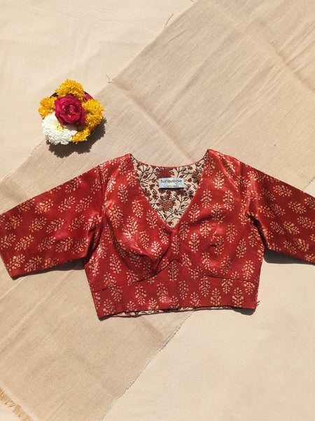 Madder dyed Ajrakh hand block print blouse in Mashru silk, naturally dyed, with V-neck, side zip closure, and pure cotton lining. Perfect for a sustainable wardrobe.