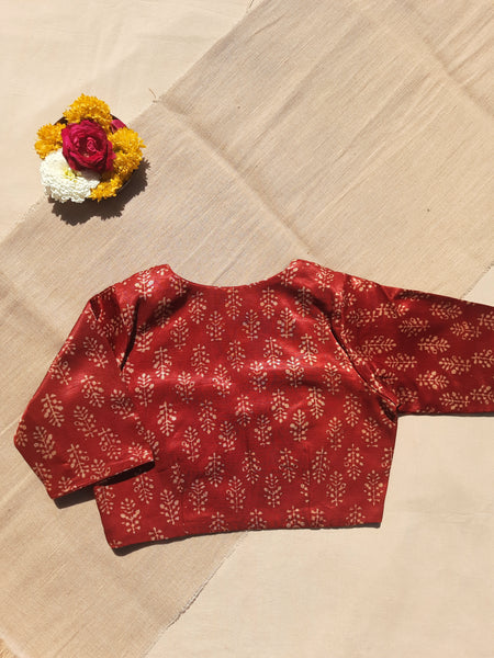 Madder dyed Ajrakh hand block print blouse in Mashru silk, naturally dyed, with V-neck, side zip closure, and pure cotton lining. Perfect for a sustainable wardrobe.