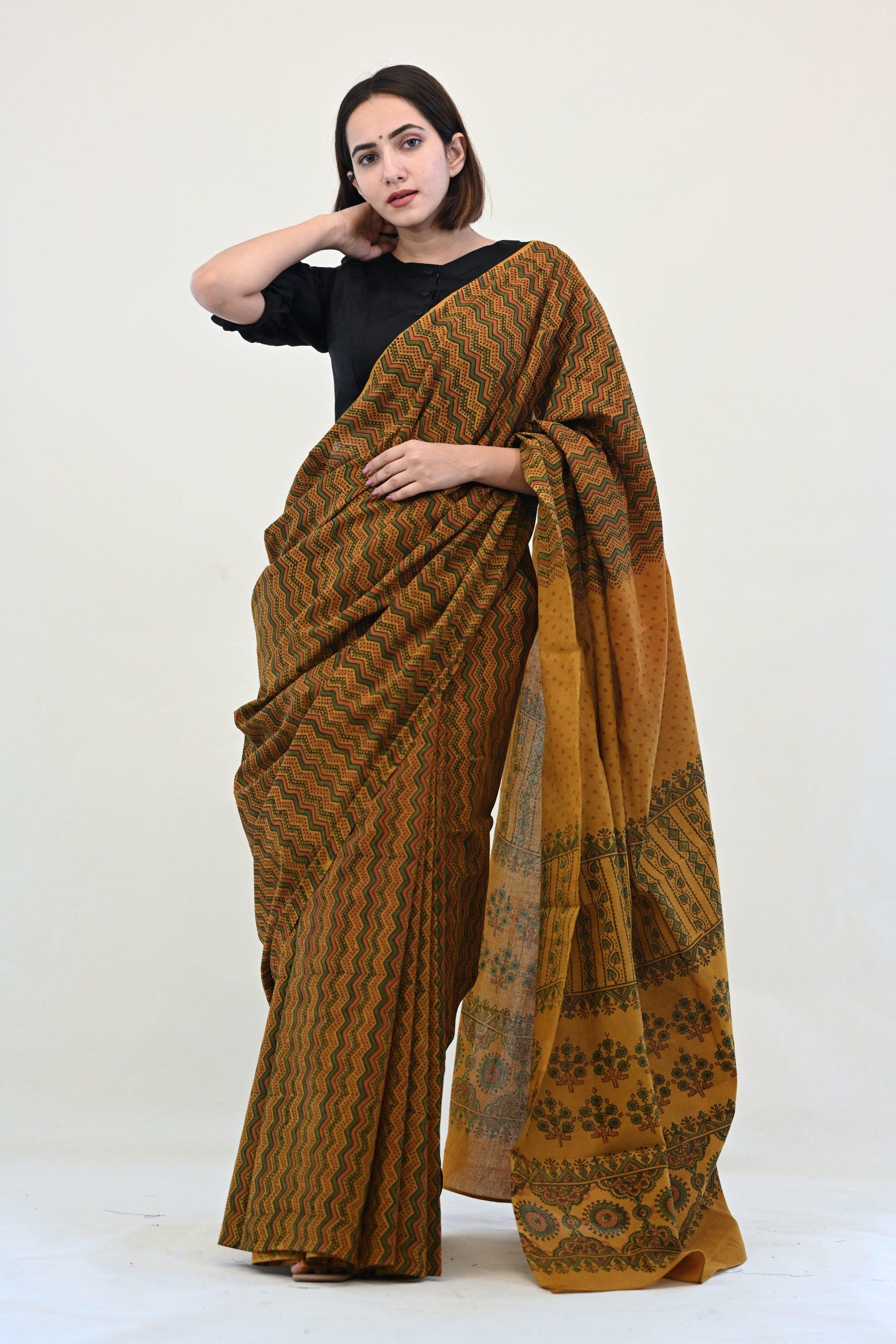 Ajrakh hand block prints cotton saree in turmeric yellow color