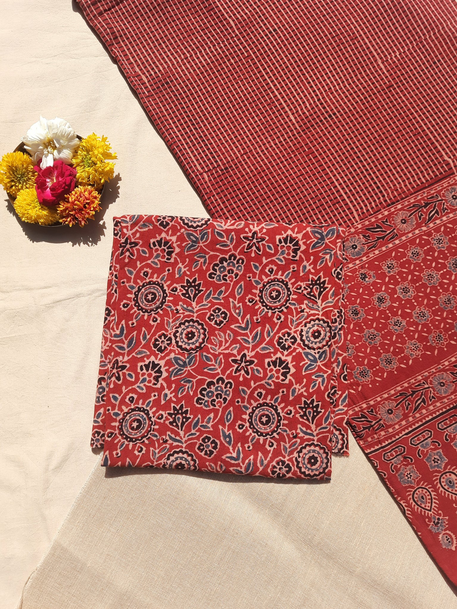 Madder-dyed Ajrakh hand block printed unstitched suit set with floral top and checkered dupatta, naturally dyed on pure cotton, handcrafted in India.