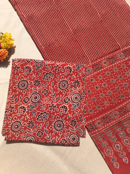 Madder-dyed Ajrakh hand block printed unstitched suit set with floral top and checkered dupatta, naturally dyed on pure cotton, handcrafted in India.