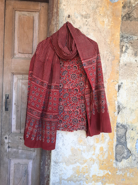 Madder-dyed Ajrakh hand block printed unstitched suit set with floral top and checkered dupatta, naturally dyed on pure cotton, handcrafted in India.