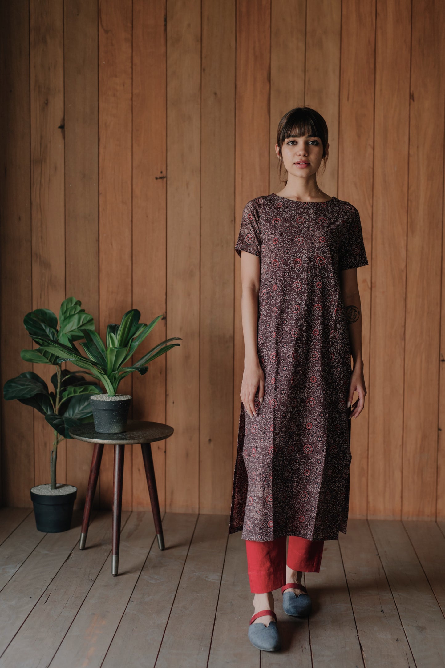 Turquoisethestore's Ajrakh Kurta Pants Set: Embrace earthy beauty with natural cotton, Earthy Brown & Madder hues, and traditional Ajrakh hand block prints. Elasticated waistband ensures comfort. Effortlessly stylish and eco-conscious fashion statement.