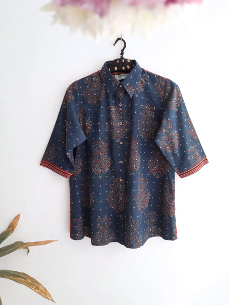 Image: Indigo and madder-dyed Ajrakh hand block print shirt for women, featuring intricate designs perfect for boho and classy summer looks. Breathable fabric ensures comfort for any outing. Shop now at Turquoisethestore.