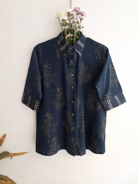 Image: Breezy Indigo Ajrakh Fusion shirt for women, featuring hand block prints in polkas, bootas, and stripes. Crafted with care, this indigo dyed shirt adds artisanal charm to any wardrobe. Shop now at Turquoisethestore.