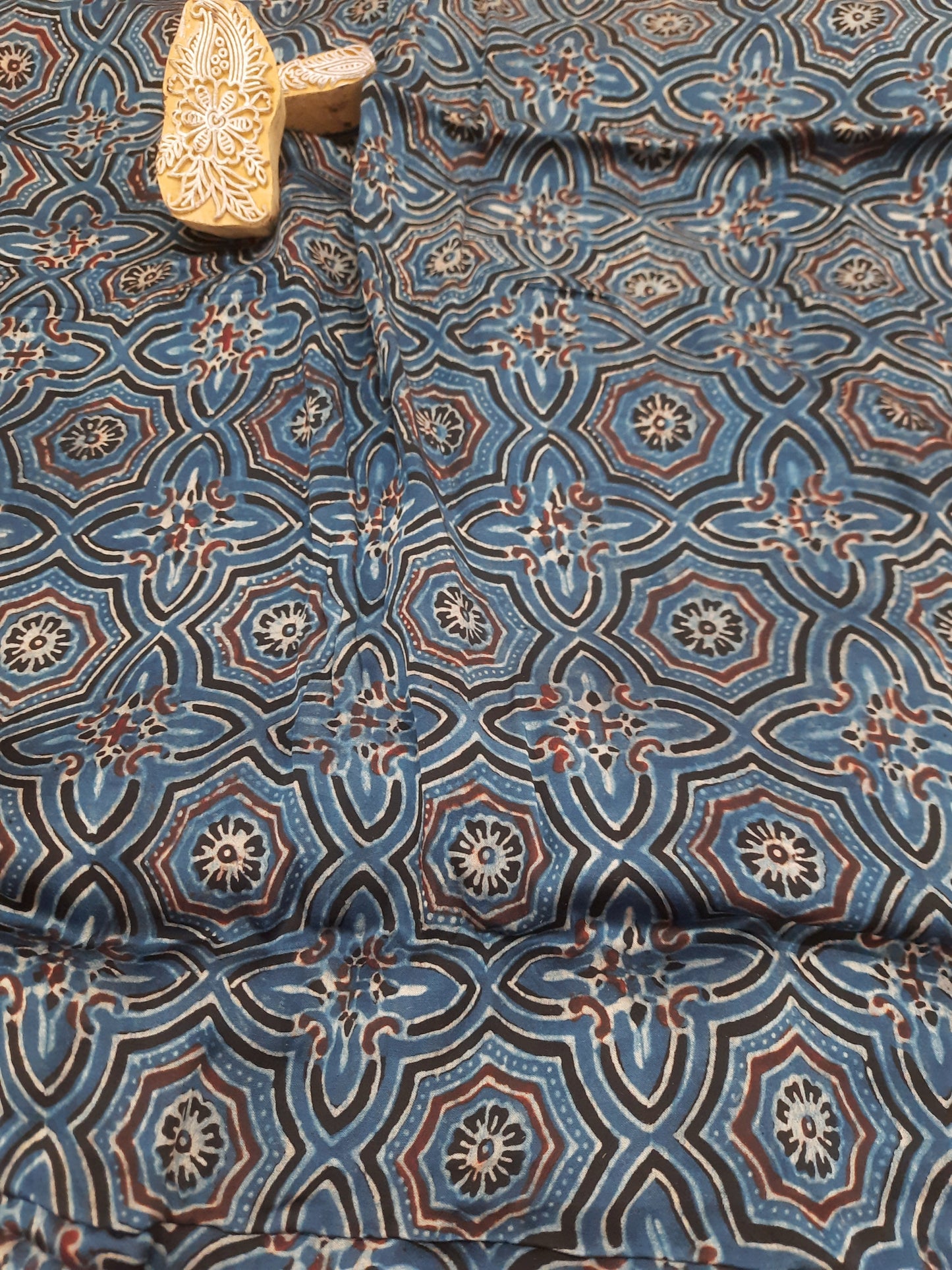 Indigo ajrakh modal silk fabric. Handcrafted sustainable fashion.