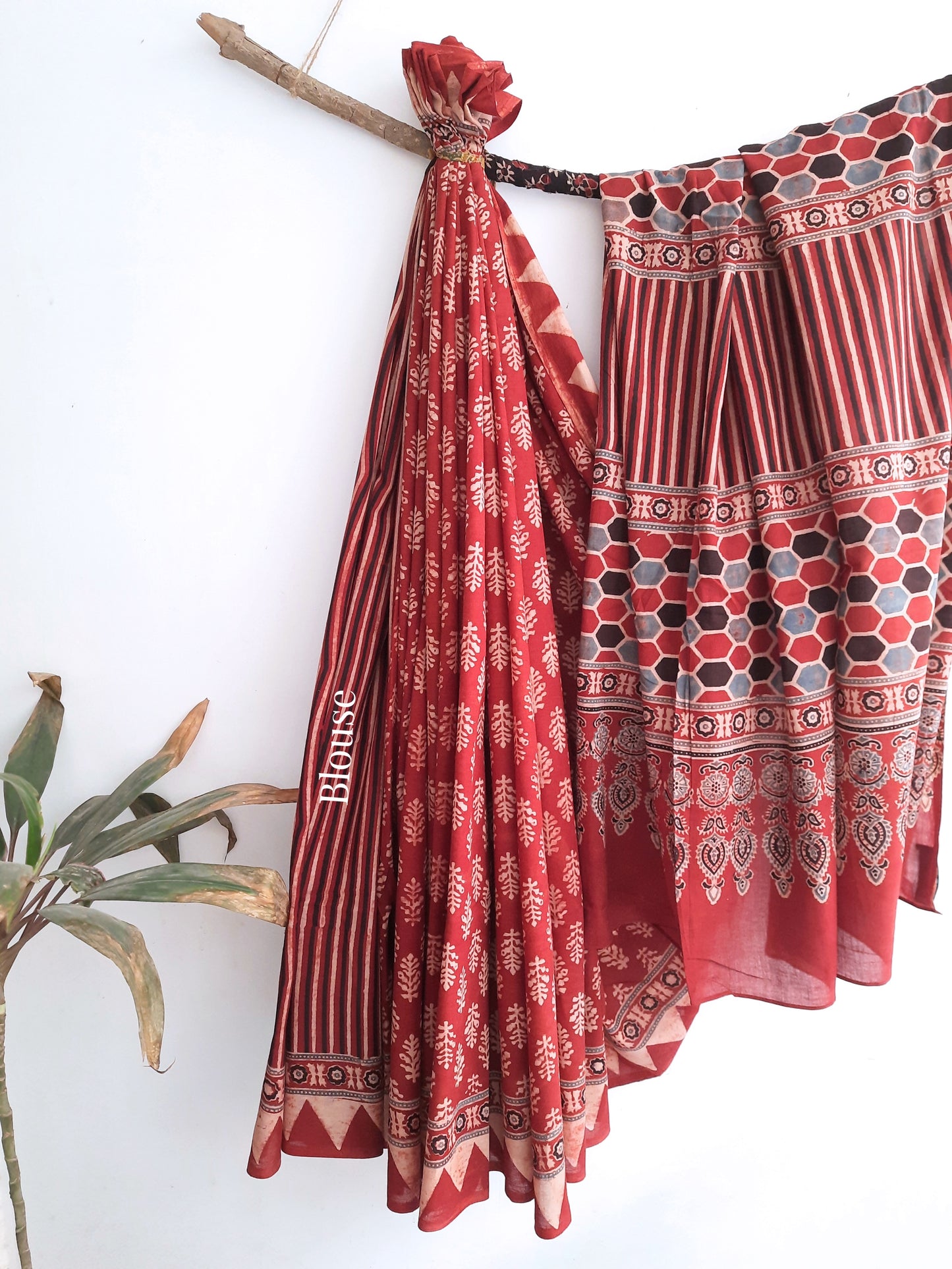 Madder Dyed Ajrakh Cotton Saree by Turquoisethestore, showcasing intricate hand block prints and natural dyes, a sustainable summer staple.