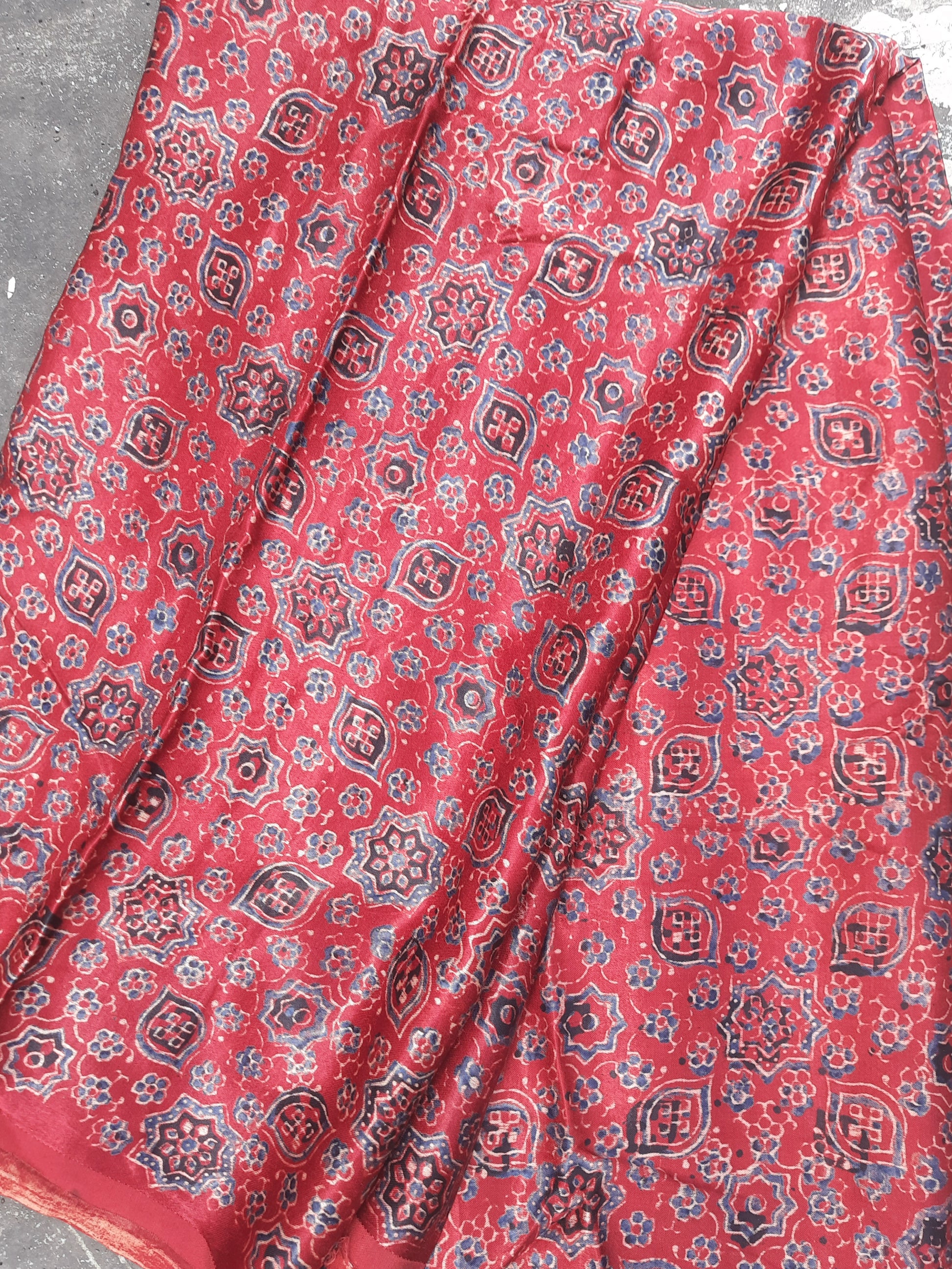 Madder red ajrakh prints fabric in mashru silk.