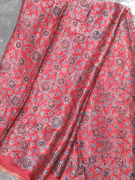 Madder red ajrakh prints fabric in mashru silk.