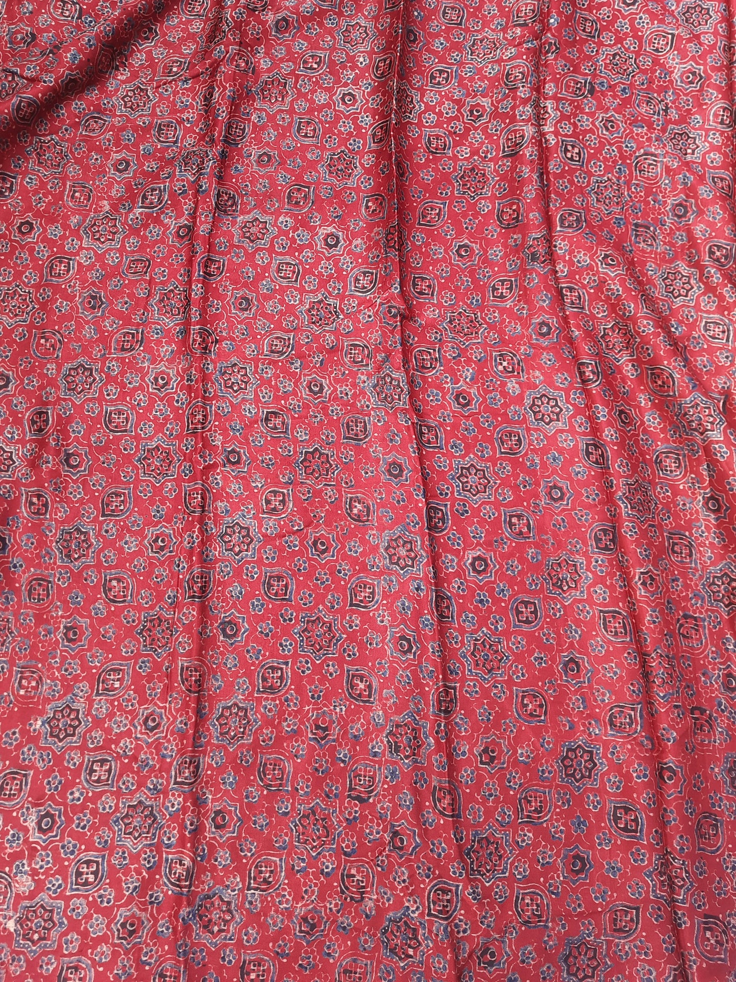 Madder red ajrakh prints fabric in mashru silk.