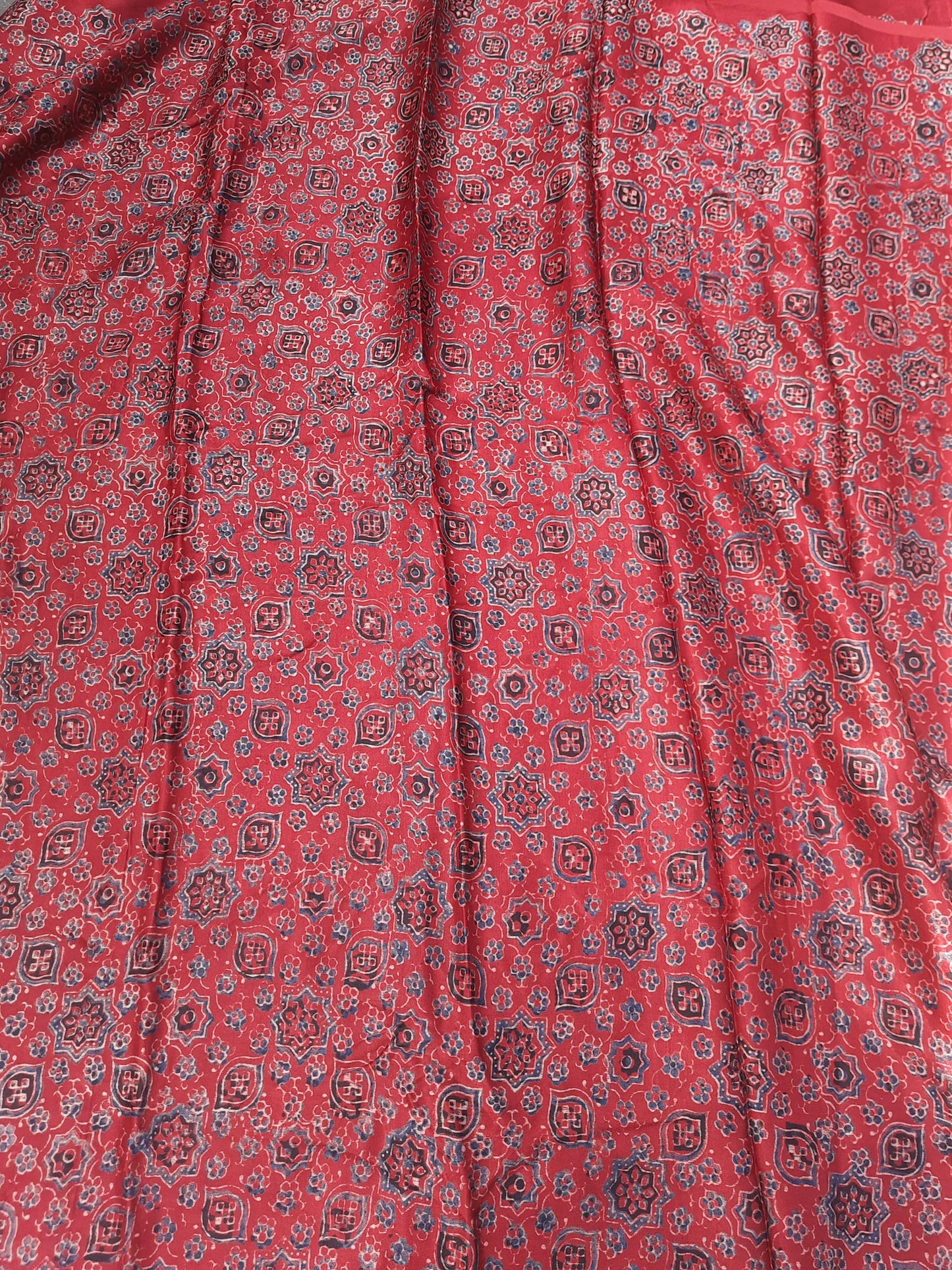 Madder red ajrakh prints fabric in mashru silk.