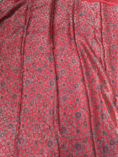 Madder red ajrakh prints fabric in mashru silk.