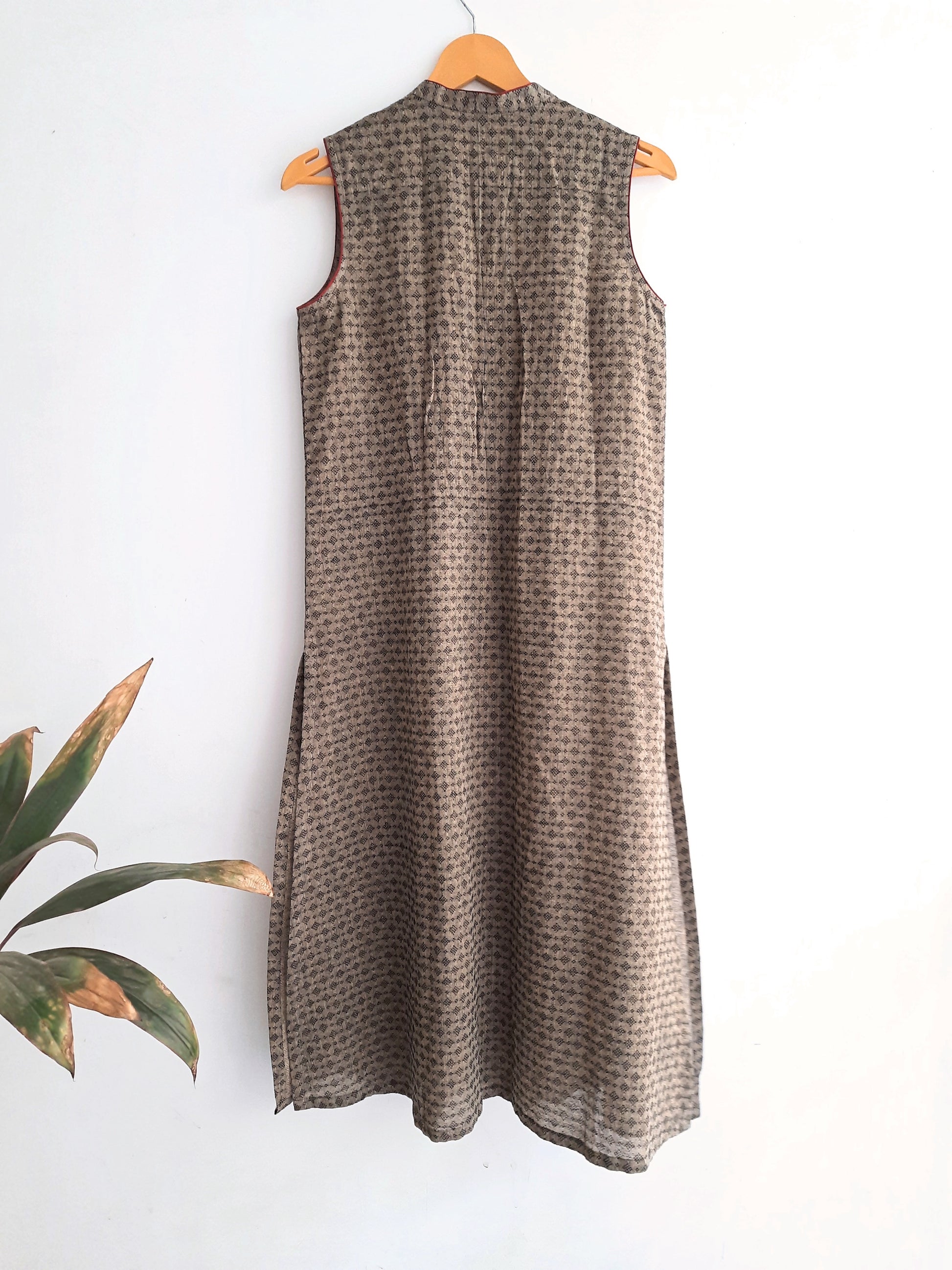 Serene Olive Coord Set - Elevate your wardrobe sustainably with this soft mangalagiri cotton ensemble. Muted olive green with a woven self design, mandarin collar, and beautiful pin tucks. Paired with elasticated waistband pants, it's perfect for everyday wear. Ethically crafted for conscious fashion choices.