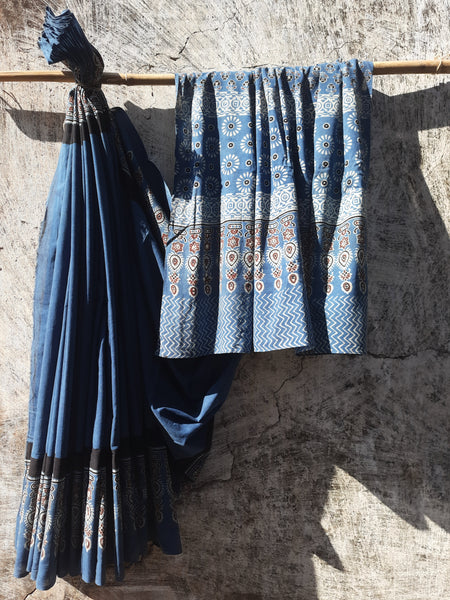 Indigo Ajrakh hand block printed saree in pure cotton, naturally dyed and ethically crafted in India, featuring breathable fabric for sustainable fashion.