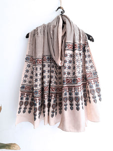 Turquoisethestore's Beige Stripes Ajrakh Cotton Dupatta, handcrafted with 100% pure cotton using traditional ajrakh methods and myrobalan dyed. Elevate your summer fashion with this eco-friendly, artisanal accessory, adding a timeless touch to any ensemble.