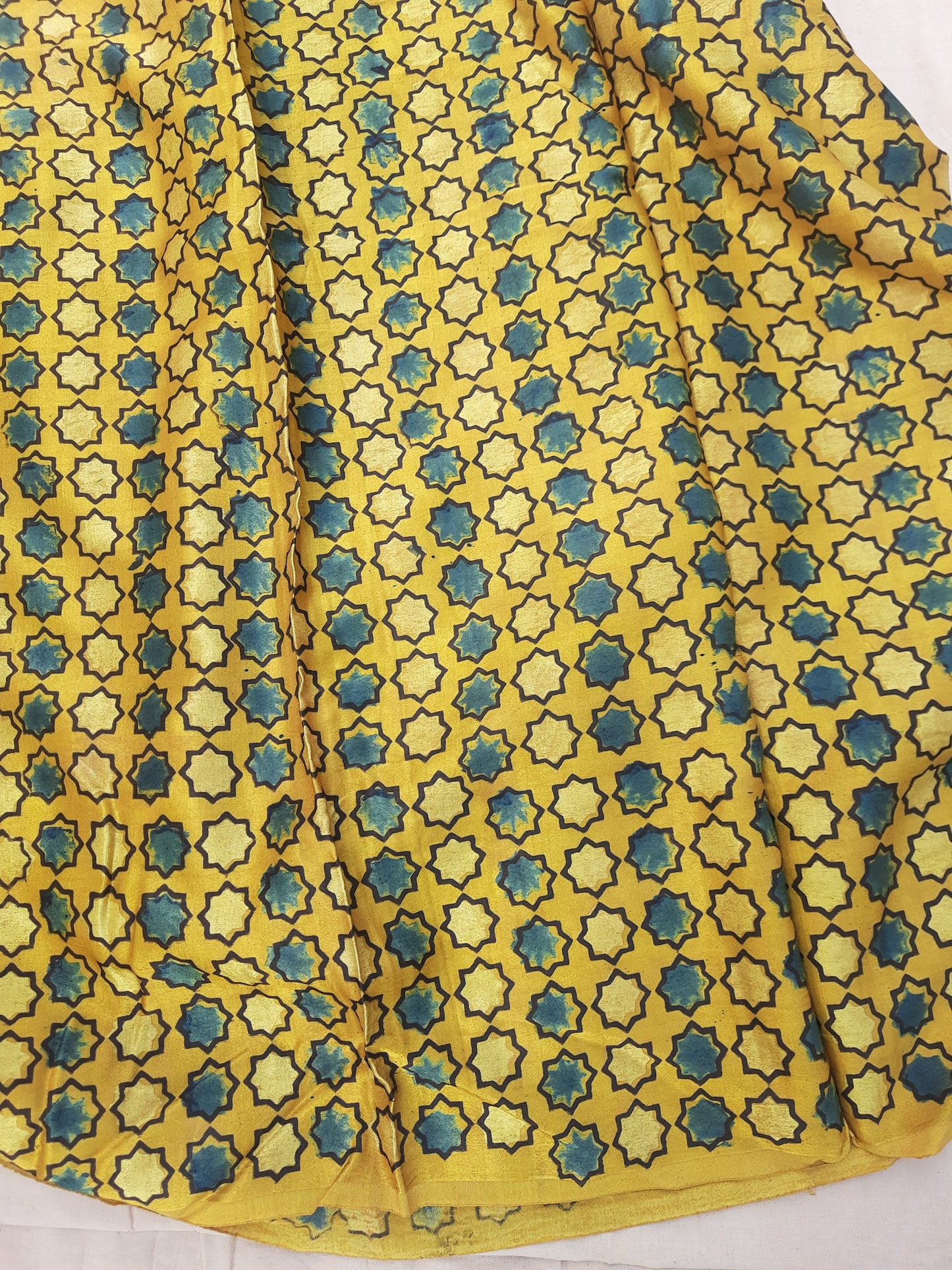 Turmeric Yellow Mashru Silk Ajrakh Fabric, handcrafted, naturally dyed, 44-inch width, slow-made luxury, perfect for eco-conscious garments and decor.