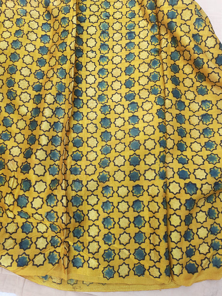 Turmeric Yellow Mashru Silk Ajrakh Fabric, handcrafted, naturally dyed, 44-inch width, slow-made luxury, perfect for eco-conscious garments and decor.