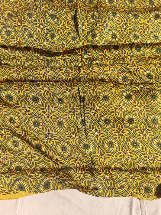 Turmeric Yellow Modal Silk Ajrakh Hand Block Printed Fabric, naturally dyed, handcrafted, 44 inches wide, sustainable luxury for eco-conscious creations.