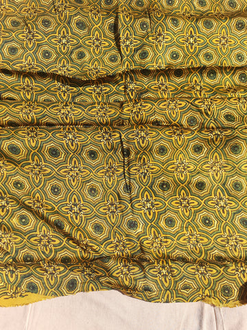 Turmeric Yellow Modal Silk Ajrakh Hand Block Printed Fabric, naturally dyed, handcrafted, 44 inches wide, sustainable luxury for eco-conscious creations.