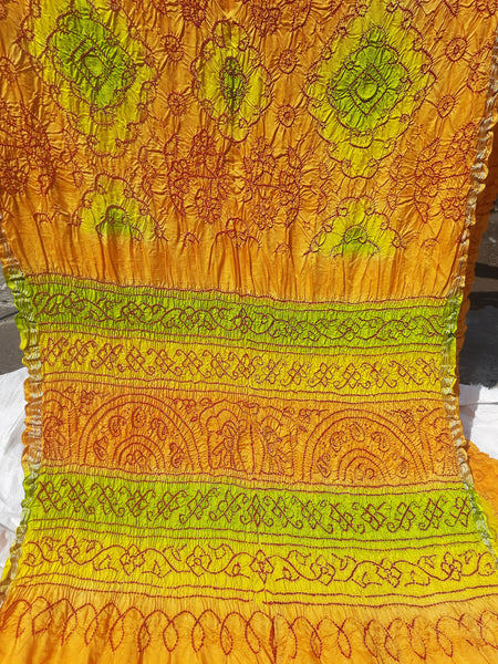 Yellow bandhani silk saree. Handcrafted gajji silk bandhani saree.