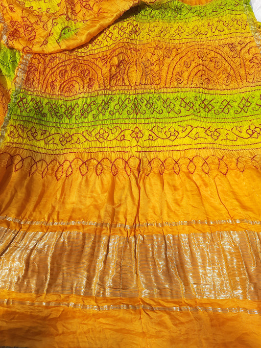 Yellow bandhani silk saree. Handcrafted gajji silk bandhani saree.