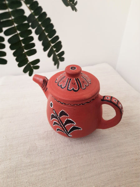 Terracotta teapot & stone age mugs