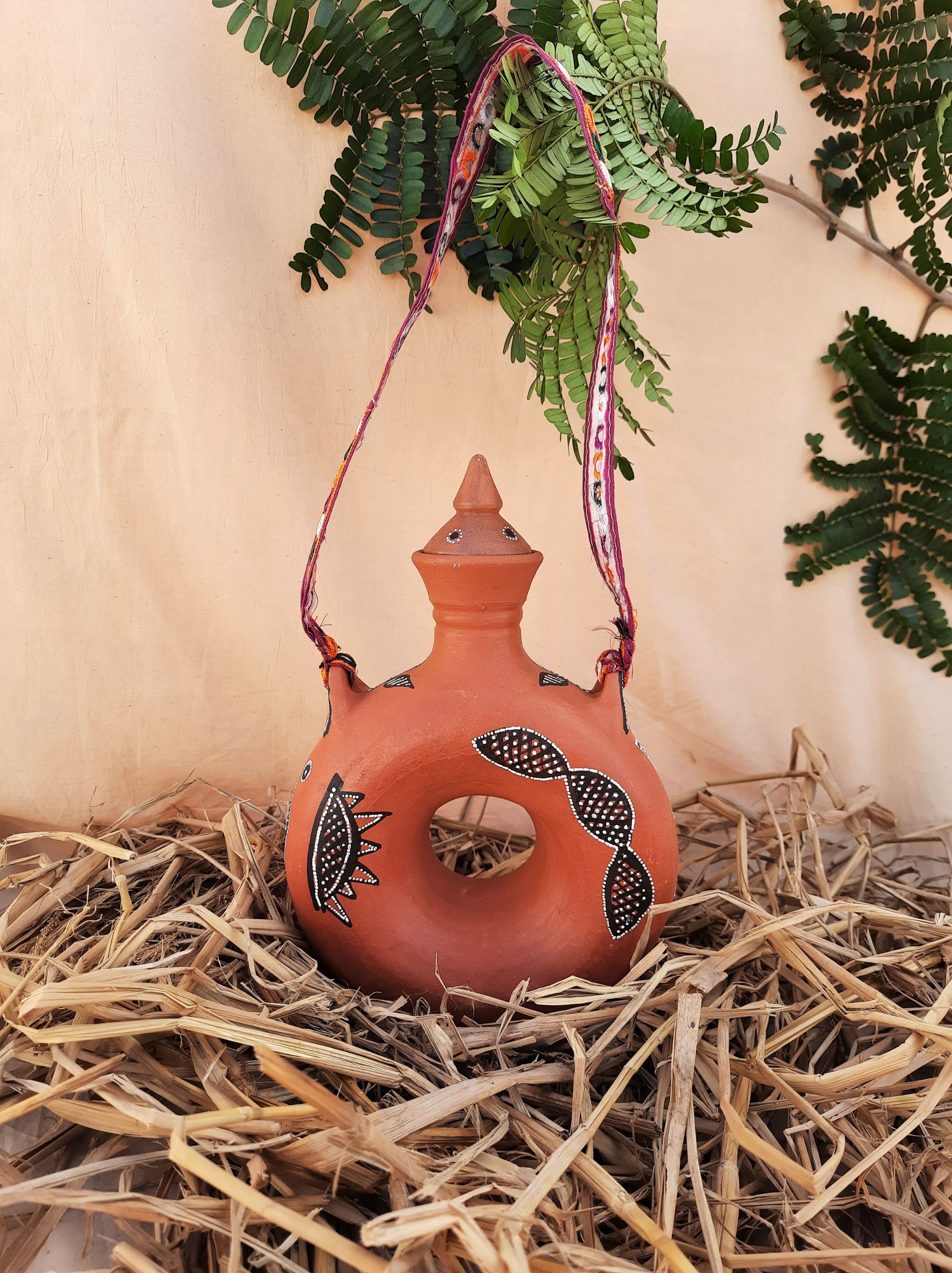 Terracotta water bottle in vintage style, traditional Indian terracotta water bottle 