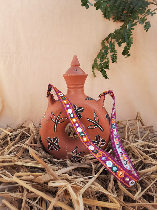 Terracotta water bottle in vintage style, traditional Indian terracotta water bottle 